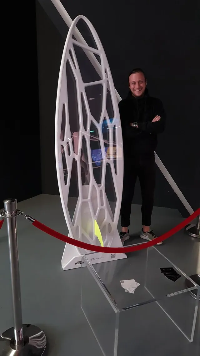 Igor with the Tidal Wave surfboard at the Expo 2020 Serbian Pavilion