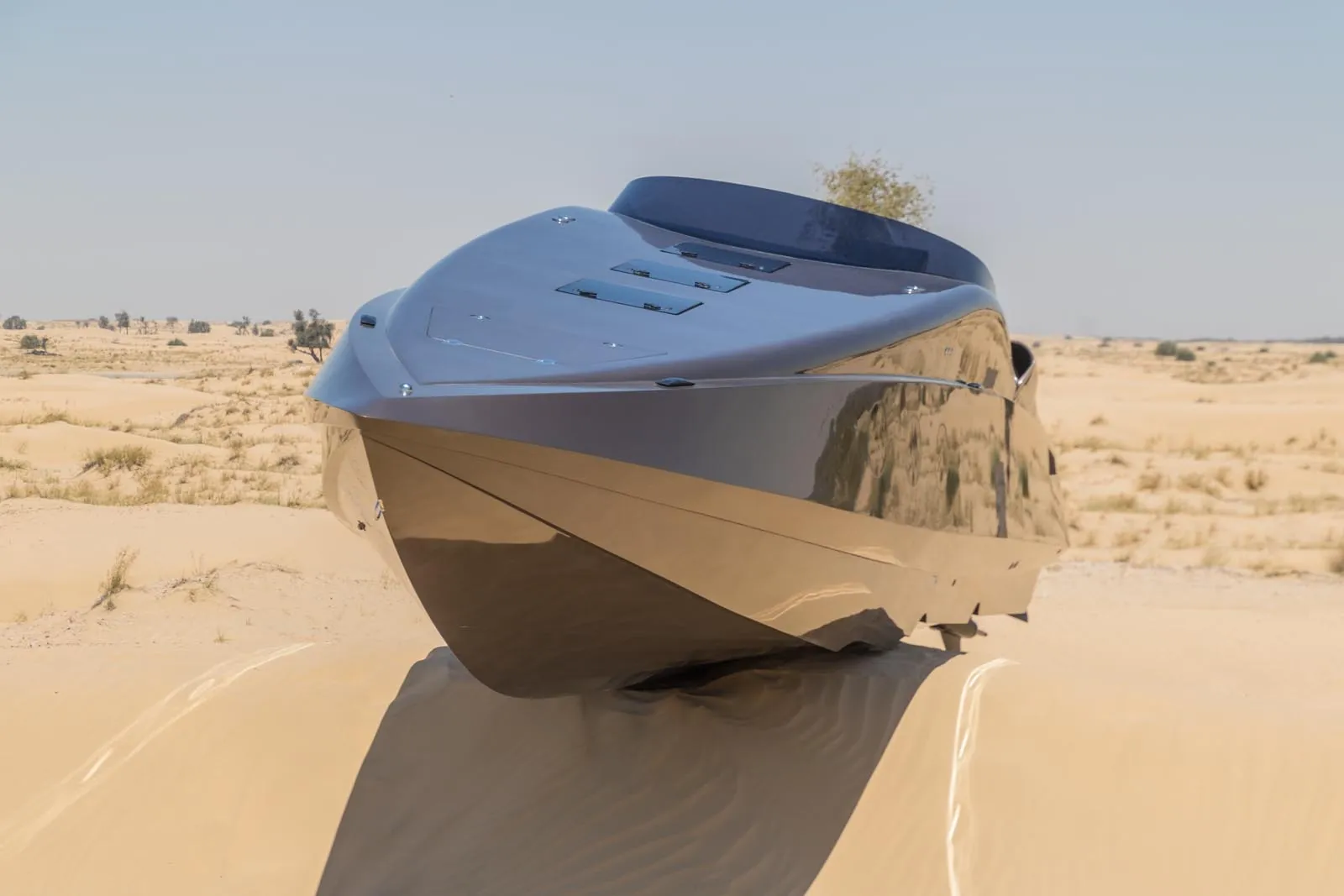 Bow raised on a dune during the Al Qudra desert shoot