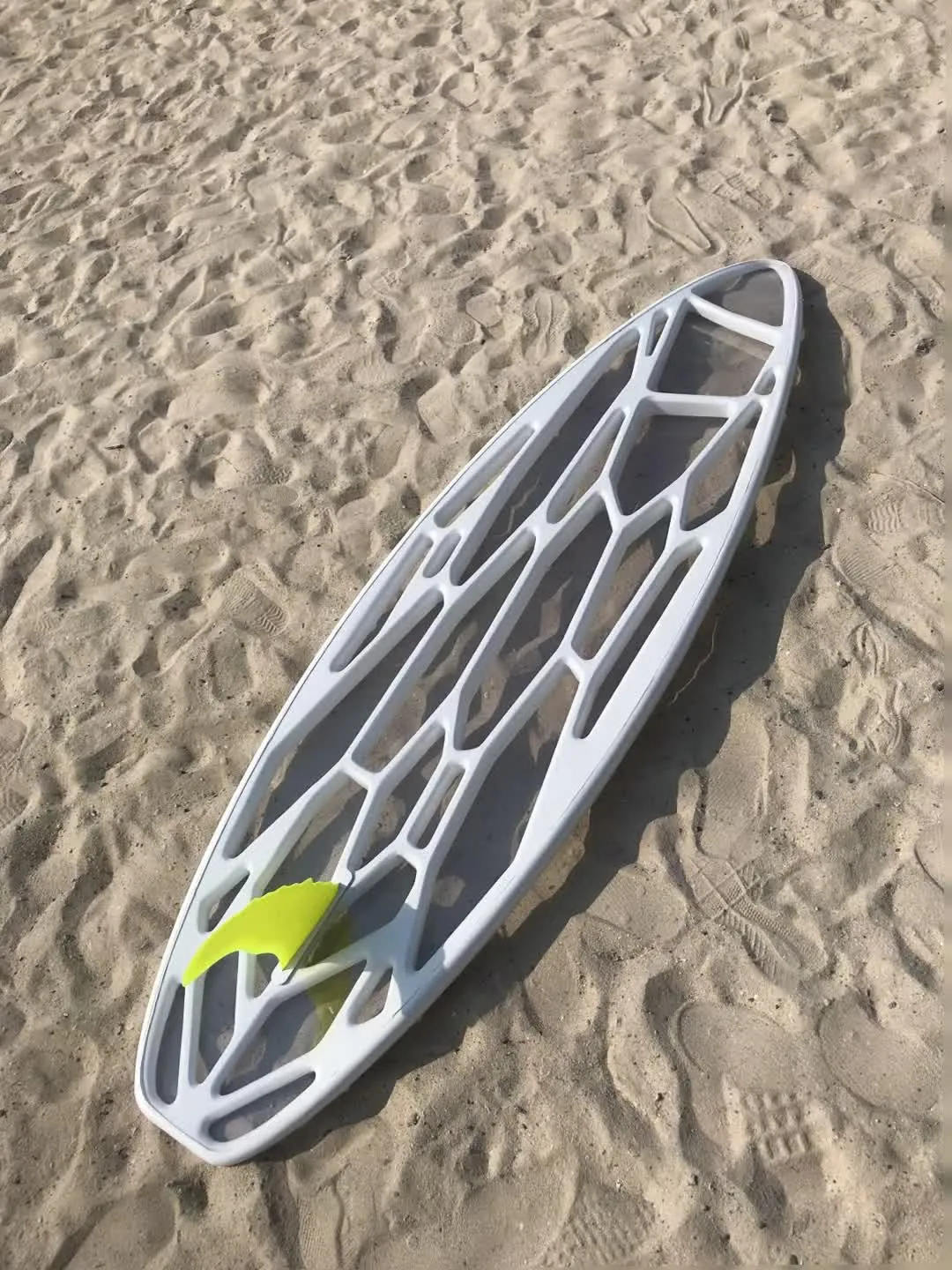 The finished board on the beach