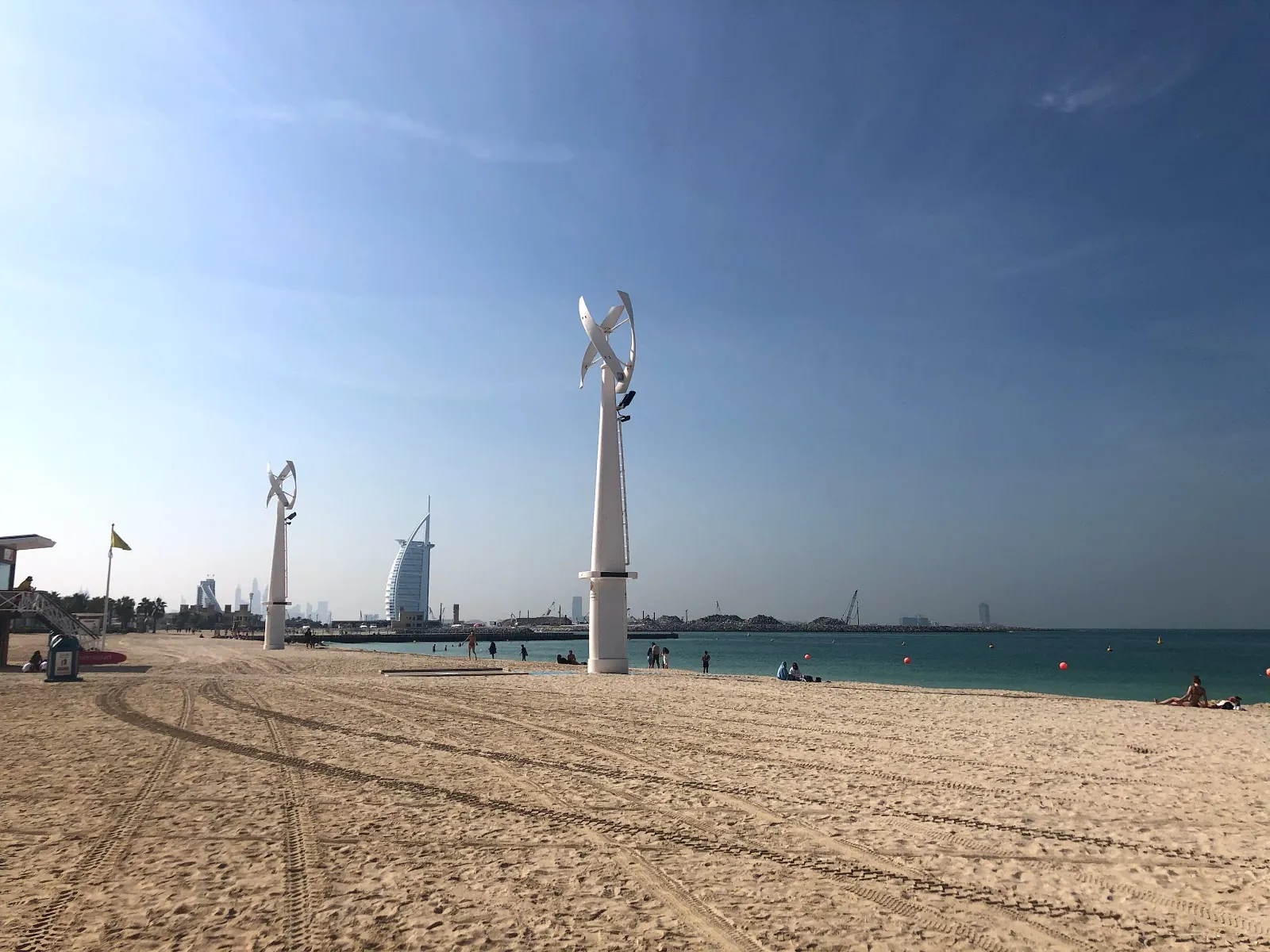 Poles along Kite Beach, with the Burj Al Arab beyond